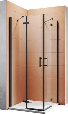 A corner shower enclosure with black frames and clear glass doors, set against a tiled wall.