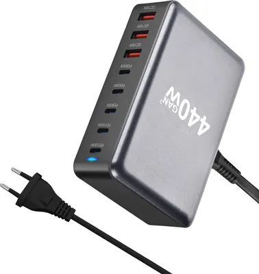 A close-up, angled view of a multi-port USB-C charging station with a power cord and plug.