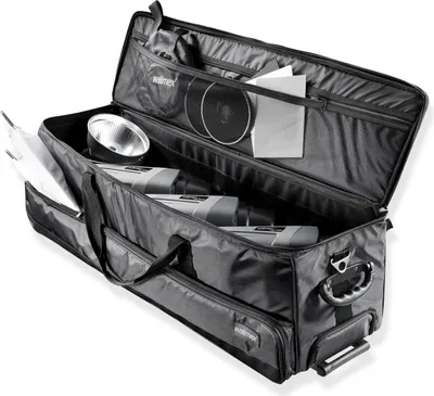 Produktbild von Walimex pro Studio-Trolley XL - schwarz - 1027 x 379 x 324 mm - inkl. ausziehbaren Trolleygriffs, gepolsterten Schultergurts, variabler Inneneinteilung, Hartgummiräder - Stativtasche, Kameratasche