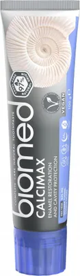 A tube of BIOMED CALCIMAX toothpaste.