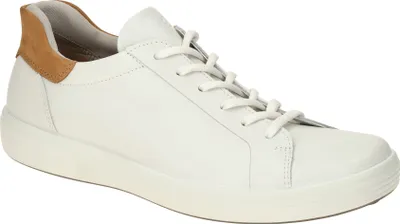 A single white leather sneaker with brown accents on the heel.