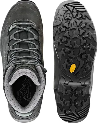 Top-down view of a pair of hiking boots, one showing the interior and laces, the other showing the sole.