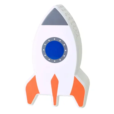 A white rocket-shaped lamp with orange fins and a blue window.