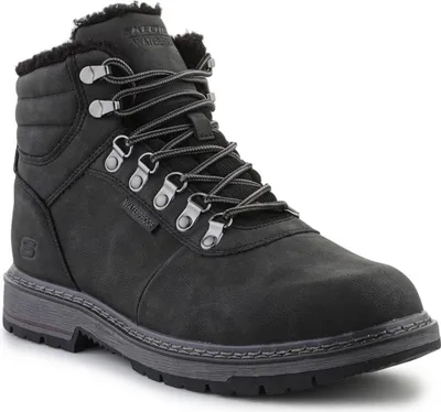 A black Skechers boot is shown against a white background.