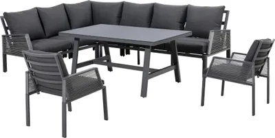A sectional outdoor sofa and chairs with a coffee table, set against a white background.