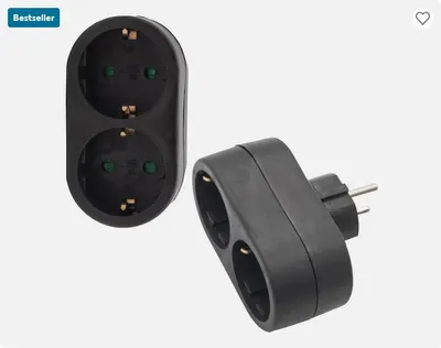 Two black electrical adapters are shown against a light gray background. One adapter is shown from the front, and the other is shown from the side.