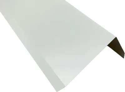 A white metal corner piece for a flat roof.