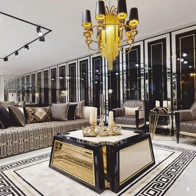 Produktbild von Casa Padrino Luxus Couchtisch Creme / Schwarz / Gold 115 cm - Hotel & Wohnzimmer Möbel