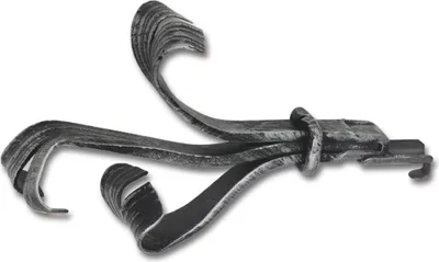 A single decorative piece for a curtain rod, made of wrought iron.