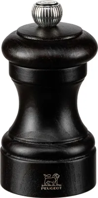 A black wooden pepper mill with a silver top.