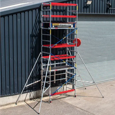 Produktbild von Trade Master Pro® Aluminiumgerüstturm | 5.7 m Arbeitshöhe | Heavy Duty| Höhenverstellbar | Faltbare Basiseinheit | 230 KG Ladekapazität | Einfache Montage | EN1004-
