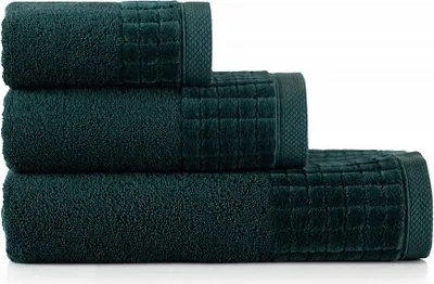Three stacked towels of varying sizes.