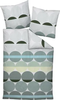 A set of bedding, including pillows and a duvet cover, laid out flat.