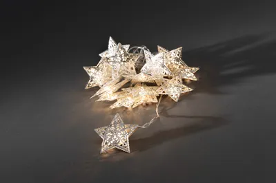 Produktbild von Konstsmide - LED Dekolichterkette, silberne Metallsterne, 16 warm weiße Dioden, 24V Innentrafo, transparentes Kabel ; 3171-303