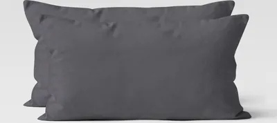 Two dark gray pillowcases are shown side-by-side against a light gray background.