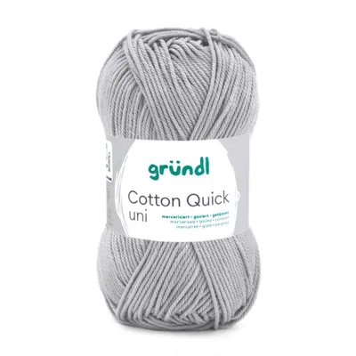 A ball of grey yarn with a label.