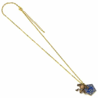 Zdjęcie produktu dla Harry Potter - Naszyjnik Czekoladowa Żaba od The Carat Shop - Akcesorium Premium