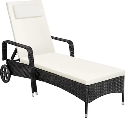 A white and black rattan sun lounger on a white background.