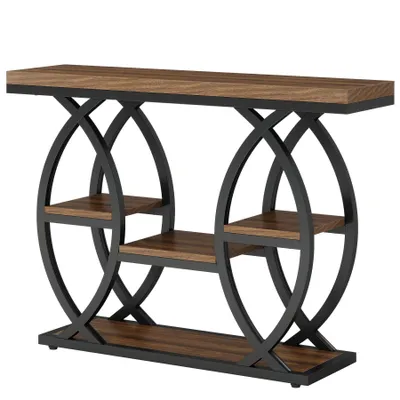 A console table with a wooden top and black metal frame with circular accents and shelves.