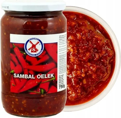 A jar of Sambal Oelek chili paste next to a bowl of the paste.