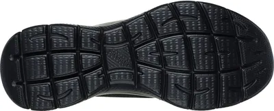 The image shows the sole of a black shoe.