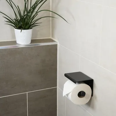 Produktbild von Toilettenpapierhalter mit Regal - matt schwarz - rostfreier Stahl