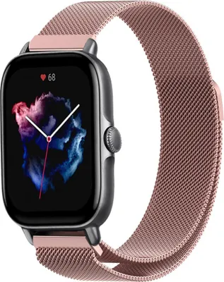 A smartwatch with a rose gold Milanese loop band is shown against a white background.
