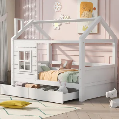 A child's bedroom with a house-shaped bed.
