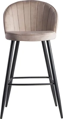 A bar stool with a beige velvet seat and black metal legs, shown from the front on a white background.