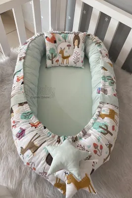 Immagine prodotto di Cestino per neonati Jaju Baby con cuscino