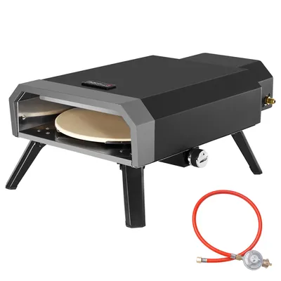 A black and gray gas pizza oven with a pizza stone inside, shown on a white background with a red gas hose and regulator.