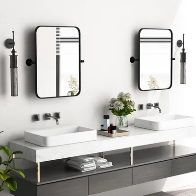 Image de Miroir de salle de bain inclinable - miroir mural rectangulaire avec cadre métallique, destiné à un usage décoratif