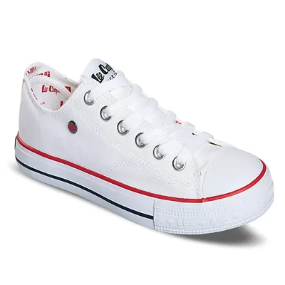A white low-top sneaker with red and black accents.
