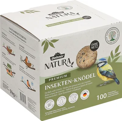 A cardboard box containing bird food.