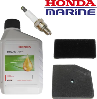 A collection of Honda marine service kit items including oil, a spark plug, and air filters, presented on a white background.