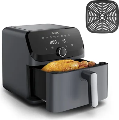 A black TEFAL Easy Fry Mega EY855B air fryer with food inside the basket, shown on a white background. A black air fryer rack is shown in the upper right corner.