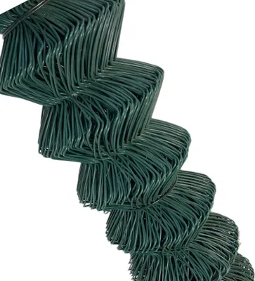A close-up, diagonal view of a roll of green chain-link fence material.