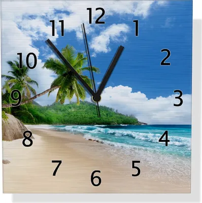 Produktbild von Wallario Design Wanduhr Urlaub auf den Seychellen unter Palmen am Sandstrand aus Aluverbund, Größe 30 x 30 cm