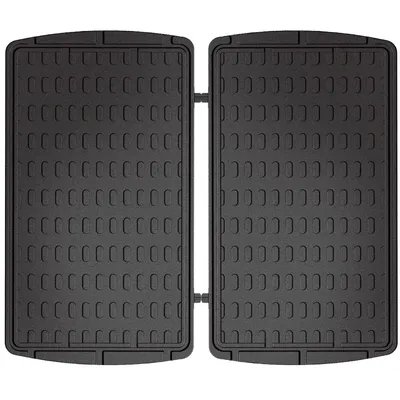 A top-down view of two black car floor mats.