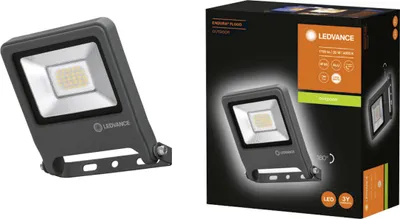A product shot of an LED floodlight next to its packaging.
