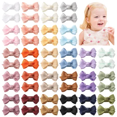 Produktbild von Set mit 52 Haarspangen für Mädchen, 3 cm Haarspangen mit Schleifen, Haarschmuck für Babys und Kleinkinder.