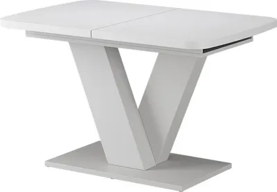 A white dining table with a V-shaped pedestal base, shown against a white background.
