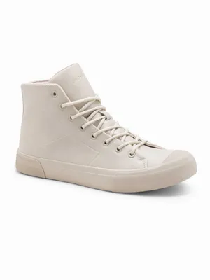 A single cream-colored high-top sneaker is shown against a white background.