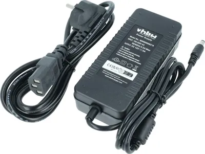 A black power adapter with two attached cables, one with a European plug and the other with a barrel connector, is shown against a white background.