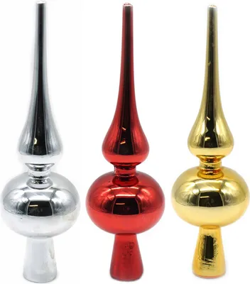 Three Christmas tree toppers in silver, red, and gold.