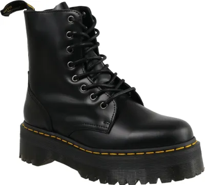 A black Dr. Martens boot with a platform sole.