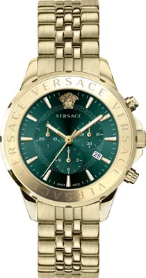 A product shot of a gold Versace watch with a green dial.