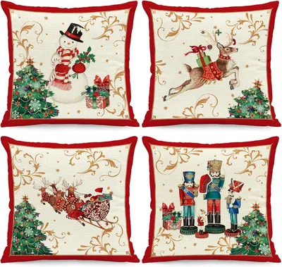 Zdjęcie produktu dla Komplet czterech pokrowców na poduszki świąteczne, 45 x 45 cm, w kolorach czerwonym i białym, motywy: wieś, dekoracje świąteczne, orzechopaczek, bałwanek, renifer, choinka