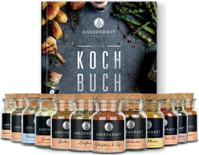 A cookbook and a set of spice jars are displayed together.