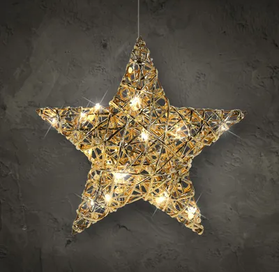 A decorative LED star light hanging against a textured gray background.